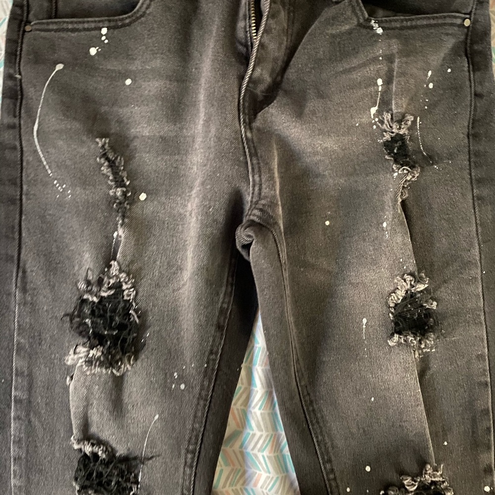 Black new cut up jeans